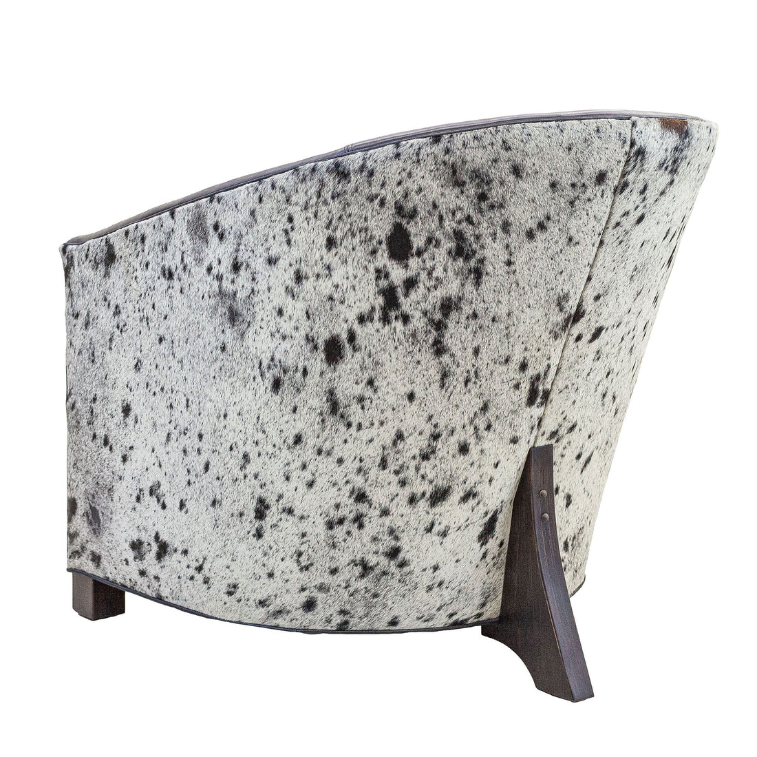 High Roller chair shown in back view with black and white speckled hair-on-hide back panel
