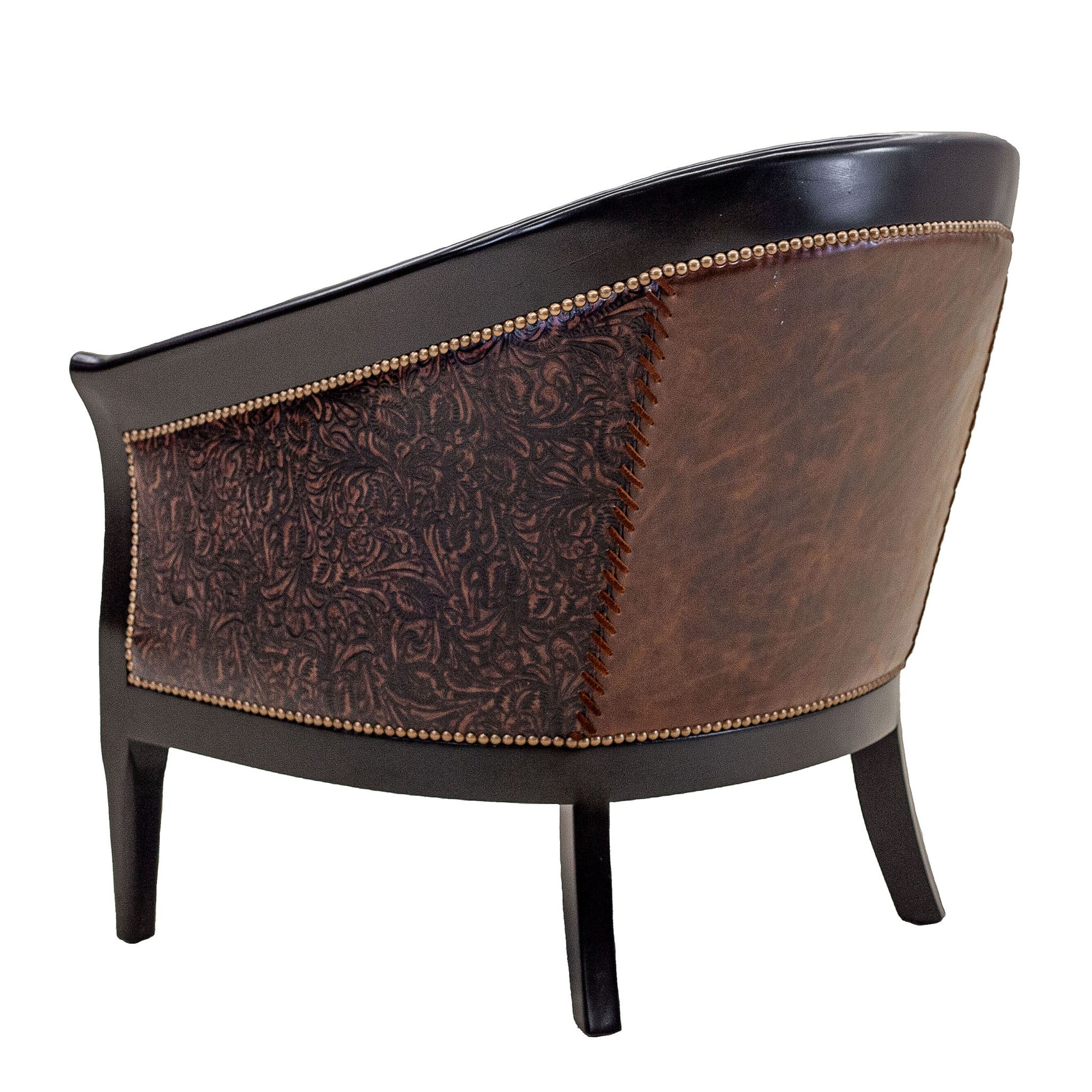 Sebastian chair in full-grain leather with embossed detailing on arms and back, pull-up leather seat, and hand-laced accents, handcrafted in America